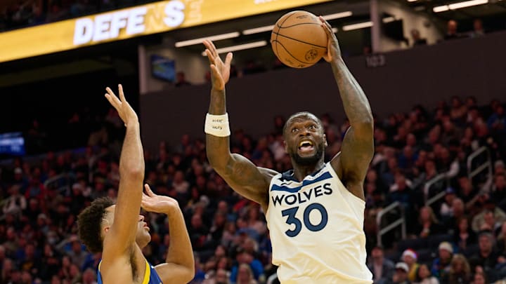 Dec 12, 2025; San Francisco, California, USA; Minnesota Timberwolves forward Julius Randle (30) shoots the ball against Golden State Warriors forward Trayce Jackson-Davis (32) during the fourth quarter at Chase Center. Mandatory Credit: Robert Edwards-Imagn Images Dec 12, 2025; San Francisco, California, USA; Minnesota Timberwolves forward Julius Randle (30) shoots the ball against Golden State Warriors forward Trayce Jackson-Davis (32) during the fourth quarter at Chase Center. Mandatory Credit: Robert Edwards-Imagn Images