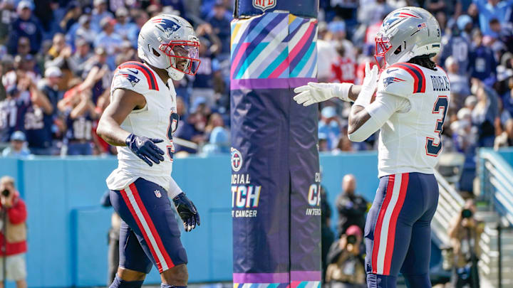 New England Patriots wide receiver Kayshon Boutte (9) celebrates his touchdown with wide receiver Demario Douglas (3) during the second quarter against the Tennessee Titans at Nissan Stadium in Nashville, Tenn., Sunday, Oct. 19, 2025.