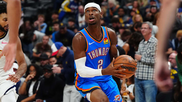 Oct 24, 2024; Denver, Colorado, USA; Oklahoma City Thunder guard Shai Gilgeous-Alexander (2) during the first quarter against the Denver Nuggets at Ball Arena. Mandatory Credit: Ron Chenoy-Imagn Images