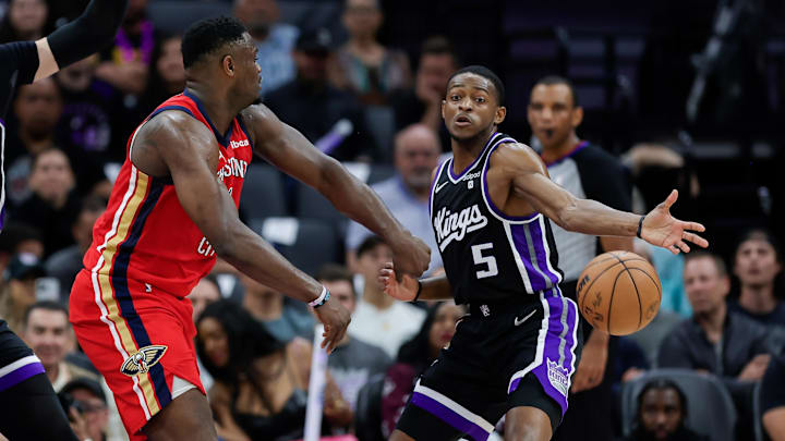 Apr 2, 2024; Sacramento, California, USA; Sacramento Kings guard De'Aaron Fox (5) breaks up a pass