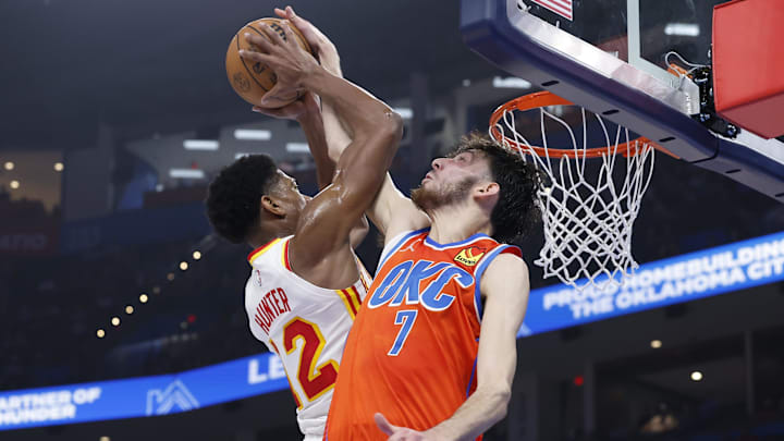 Nov 6, 2023; Oklahoma City, Oklahoma, USA; Oklahoma City Thunder forward Chet Holmgren (7) blocks a shot by Atlanta Hawks forward De'Andre Hunter (12) during the second quarter at Paycom Center. Mandatory Credit: Alonzo Adams-Imagn Images