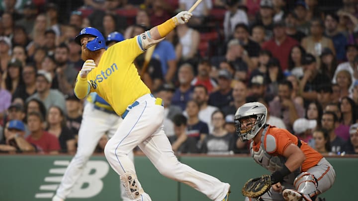 Sep 9, 2023; Boston, Massachusetts, USA;  Boston Red Sox designated hitter Justin Turner (2) hits a