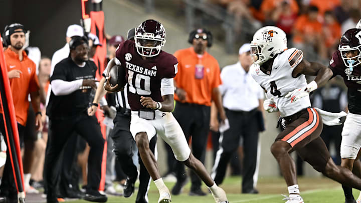 Sep 21, 2024; College Station, Texas, USA; Texas A&M Aggies quarterback Marcel Reed (10) runs the ball during the second half against the Bowling Green Falcons at Kyle Field. Mandatory Credit: Maria Lysaker-Imagn Images. 