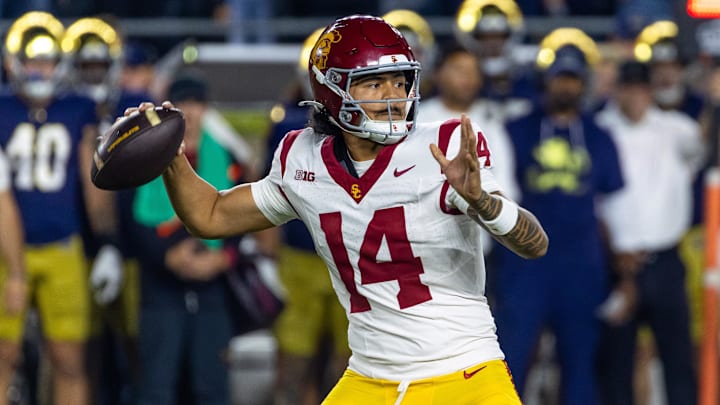 Oct 18, 2025; South Bend, Indiana, USA; Southern California Trojans quarterback Jayden Maiava (14) passes the ball against the Notre Dame Fighting Irish during the first half at Notre Dame Stadium. 