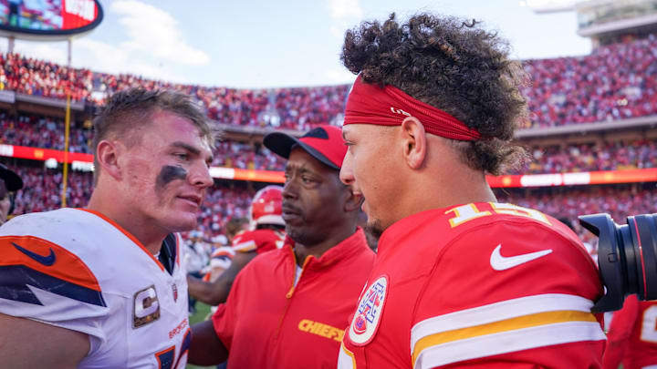 Nov 10, 2024; Kansas City, Missouri, USA; Kansas City Chiefs quarterback Patrick Mahomes (15) greets Denver Broncos quarterback Bo Nix (10) after the game at GEHA Field at Arrowhead Stadium. Mandatory Credit: Denny Medley-Imagn Images