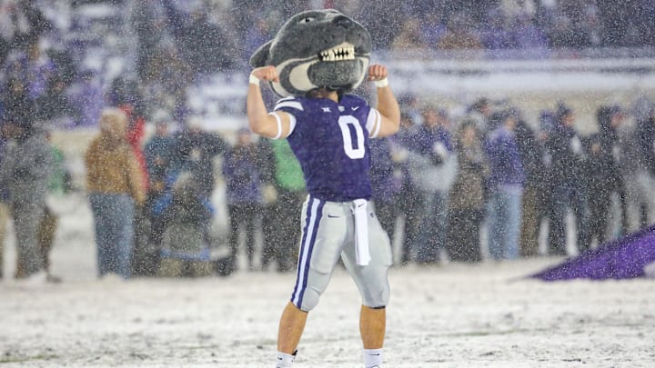 Nov 25, 2023; Manhattan, Kansas, USA; Kansas State Wildcats mascot Willie Wildcat flexes before the game against Iowa State.