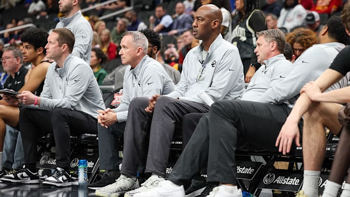 Mar 12, 2025; Kansas City, MO, USA; Colorado Buffaloes assistant coach Danny Manning watches game play during the first half against the West Virginia Mountaineers at T-Mobile Center. Mandatory Credit: William Purnell-Imagn Images