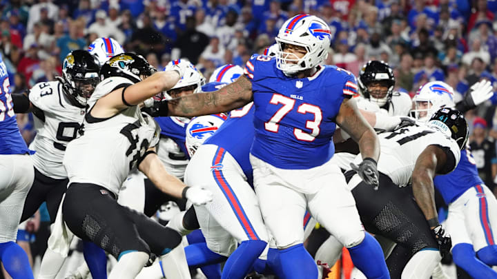 Sep 23, 2024; Orchard Park, New York, USA; Buffalo Bills offensive tackle Dion Dawkins (73) blocks Jacksonville Jaguars linebacker Chad Muma (48) Sep 23, 2024; Orchard Park, New York, USA; Buffalo Bills offensive tackle Dion Dawkins (73) blocks Jacksonville Jaguars linebacker Chad Muma (48)