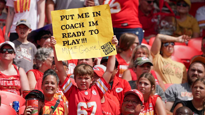 Aug 26, 2023; Kansas City, Missouri, USA; A young Kansas City Chiefs fan shows his support against