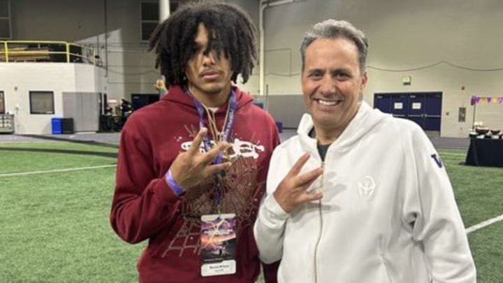 Maurice Williams and Jedd Fisch share a recruiting moment. 