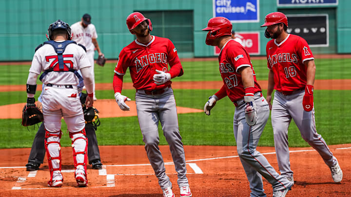 Jun 4, 2025; Boston, Massachusetts, USA; Los Angeles Angels outfielder Taylor Ward (3) is congratulated after hitting a three run home run against the Boston Red Sox in the first inning at Fenway Park. Mandatory Credit: David Butler II-Imagn Images