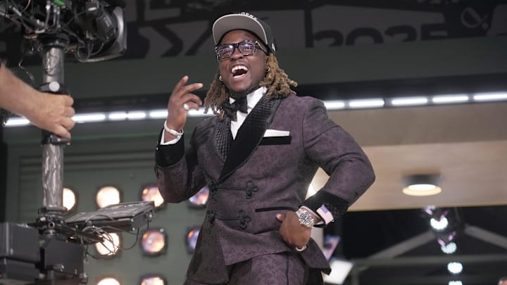 Boise State Broncos running back Ashton Jeanty poses after being selected by the Las Vegas Raiders as the number six pick in the first round of the 2025 NFL Draft at Lambeau Field. Boise State Broncos running back Ashton Jeanty poses after being selected by the Las Vegas Raiders as the number six pick in the first round of the 2025 NFL Draft at Lambeau Field.