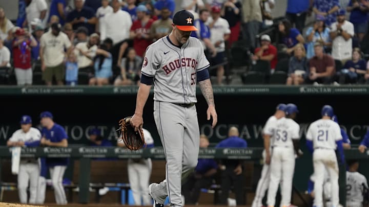 Houston Astros pitcher Ryan Pressly (55) is taken out of the game. Mandatory Credit: Raymond Carlin III-USA TODAY Sports