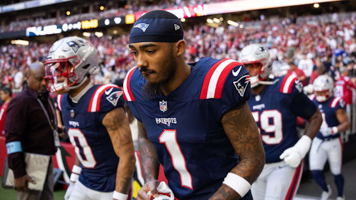 Dec 15, 2024; Glendale, Arizona, USA; New England Patriots wide receiver Ja'Lynn Polk (1) against the Arizona Cardinals at State Farm Stadium. Mandatory Credit: Mark J. Rebilas-Imagn Images