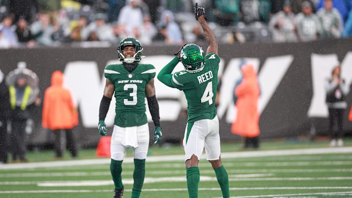 Dec 10, 2023; East Rutherford, New Jersey, USA; New York Jets cornerback D.J. Reed (4) and safety Jordan Whitehead (3) celebrate a defensive stop during the second half against the Houston Texans at MetLife Stadium. Dec 10, 2023; East Rutherford, New Jersey, USA; New York Jets cornerback D.J. Reed (4) and safety Jordan Whitehead (3) celebrate a defensive stop during the second half against the Houston Texans at MetLife Stadium.
