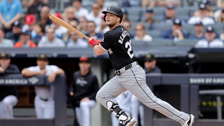 May 18, 2024; Bronx, New York, USA; Chicago White Sox left fielder Andrew Benintendi (23) follows through on an RBI double during the first inning against the New York Yankees at Yankee Stadium. Mandatory Credit: Brad Penner-USA TODAY Sports