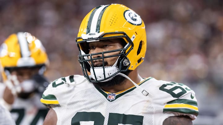 Oct 19, 2025; Glendale, Arizona, USA; Green Bay Packers guard Aaron Banks (65) against the Arizona Cardinals at State Farm Stadium. Mandatory Credit: Mark J. Rebilas-Imagn Images Oct 19, 2025; Glendale, Arizona, USA; Green Bay Packers guard Aaron Banks (65) against the Arizona Cardinals at State Farm Stadium. Mandatory Credit: Mark J. Rebilas-Imagn Images