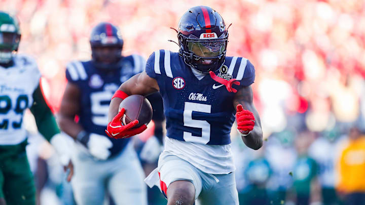 Dec 20, 2025; Oxford, MS, USA; Mississippi Rebels running back Kewan Lacy (5) carries the ball for a touchdown against the Tulane Green Wave during the first half of a game at Vaught-Hemingway Stadium. Mandatory Credit: Petre Thomas-Imagn Images