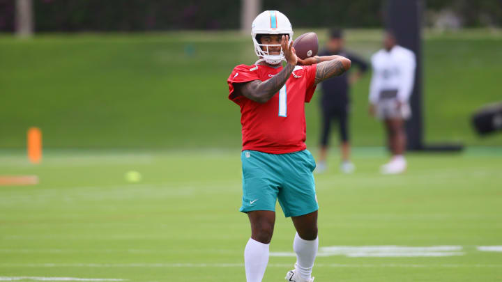 Miami Dolphins quarterback Tua Tagovailoa (1) throws the football during mandatory minicamp at the Baptist Health Training Complex.