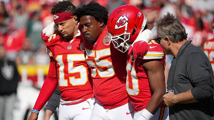 Oct 19, 2025; Kansas City, Missouri, USA; Kansas City Chiefs defensive tackle Omarr Norman-Lott (55) is helped off the field by quarterback Patrick Mahomes (15) and and cornerback Nohl Williams (20) after an injury against the Las Vegas Raiders during the third quarter of the game at GEHA Field at Arrowhead Stadium. Mandatory Credit: Denny Medley-Imagn Images Oct 19, 2025; Kansas City, Missouri, USA; Kansas City Chiefs defensive tackle Omarr Norman-Lott (55) is helped off the field by quarterback Patrick Mahomes (15) and and cornerback Nohl Williams (20) after an injury against the Las Vegas Raiders during the third quarter of the game at GEHA Field at Arrowhead Stadium. Mandatory Credit: Denny Medley-Imagn Images