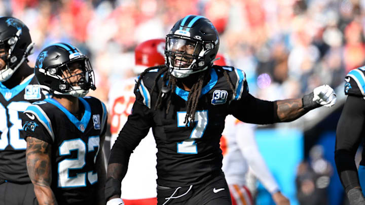 Nov 24, 2024; Charlotte, North Carolina, USA; Carolina Panthers linebacker Jadeveon Clowney (7) reacts after a sack in the second quarter at Bank of America Stadium. Mandatory Credit: Bob Donnan-Imagn Images
