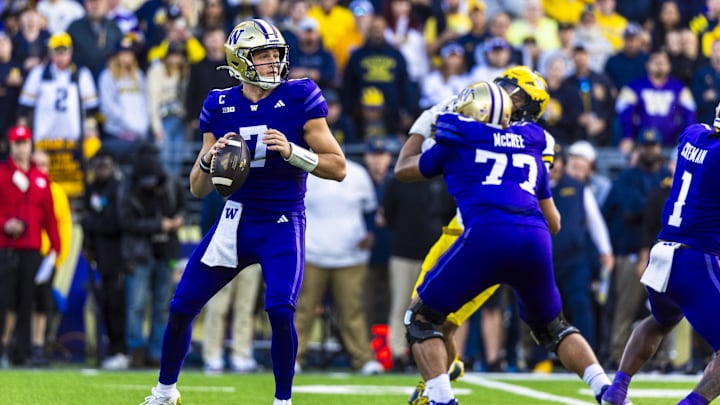 Oct 5, 2024; Seattle, Washington, USA; Washington Huskies quarterback Will Rogers (7) passes against the Michigan Wolverines during the first quarter at Alaska Airlines Field at Husky Stadium. Mandatory Credit: Joe Nicholson-Imagn Images