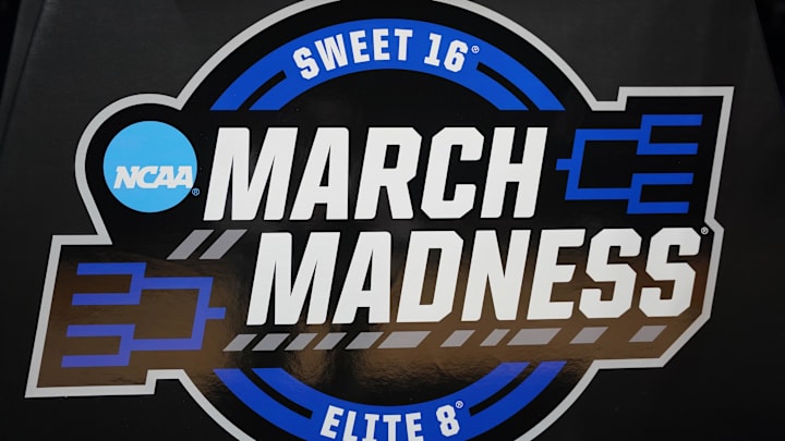 Mar 27, 2025; Indianapolis, IN, USA; The March Madness logo is seen during the NCAA tournament Midwest regional practice day at Lucas Oil Stadium. Mandatory Credit: Robert Goddin-Imagn Images Mar 27, 2025; Indianapolis, IN, USA; The March Madness logo is seen during the NCAA tournament Midwest regional practice day at Lucas Oil Stadium. Mandatory Credit: Robert Goddin-Imagn Images