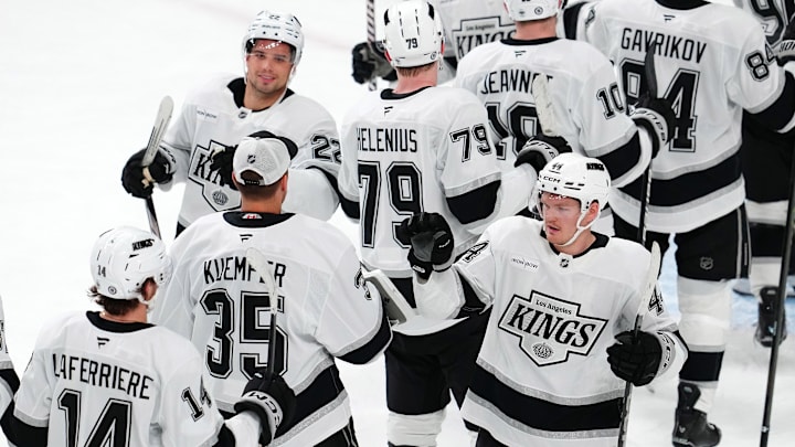 Mar 9, 2025; Las Vegas, Nevada, USA; Los Angeles Kings players celebrate after defeating the Vegas Golden Knights 6-5 at T-Mobile Arena. Mandatory Credit: Stephen R. Sylvanie-Imagn Images