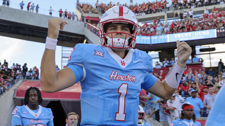 Houston Cougars quarterback Conner Weigman (1) enters the field before playing against the Texas Tech Raiders at TDECU Stadium. Houston Cougars quarterback Conner Weigman (1) enters the field before playing against the Texas Tech Raiders at TDECU Stadium.