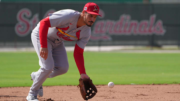 Feb 17, 2025; Jupiter, FL, USA;  St. Louis Cardinals third base Nolan Arenado (28) takes infield practice at spring training. Mandatory Credit: Jim Rassol-Imagn Images
