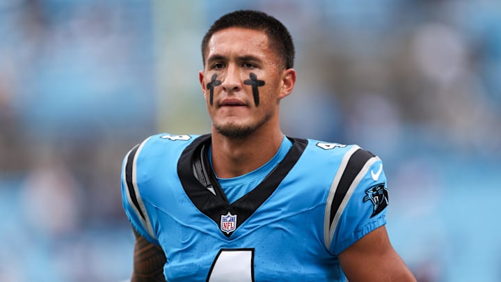 Carolina Panthers wide receiver Tetairoa McMillan (4) looks on during warm ups prior to the game against the Dallas Cowboys at Bank of America Stadium. 