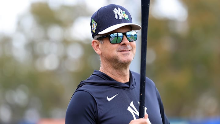 Feb 12, 2026; Tampa, FL, USA;  New York Yankees manager Aaron Boone (17) works out during spring training workouts at George M. Steinbrenner Field. Mandatory Credit: Kim Klement Neitzel-Imagn Images