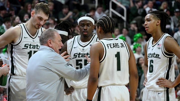 Feb 22, 2026; East Lansing, Michigan, USA; Michigan State Spartans head coach Tom Izzo huddles with his players during the first half against the Ohio State Buckeyes at Jack Breslin Student Events Center. Mandatory Credit: Dale Young-Imagn Images Feb 22, 2026; East Lansing, Michigan, USA; Michigan State Spartans head coach Tom Izzo huddles with his players during the first half against the Ohio State Buckeyes at Jack Breslin Student Events Center. Mandatory Credit: Dale Young-Imagn Images