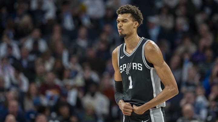 Dec 29, 2024; Minneapolis, Minnesota, USA; San Antonio Spurs center Victor Wembanyama (1) reacts after making a shot against the Minnesota Timberwolves in the first half at Target Center. Mandatory Credit: Jesse Johnson-Imagn Images