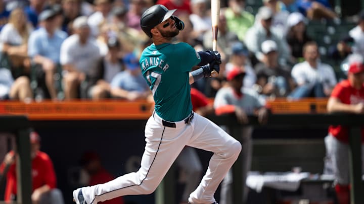 Seattle Mariners right fielder Mitch Haniger swings during a game against the Los Angeles Angels on July 24 at T-Mobile Park. Seattle Mariners right fielder Mitch Haniger swings during a game against the Los Angeles Angels on July 24 at T-Mobile Park.