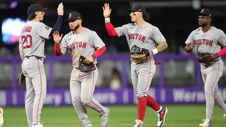 The Boston Red Sox celebrate a win in extra innings over the Miami Marlins.