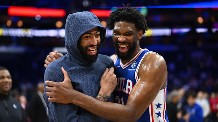 Feb 4, 2025; Philadelphia, Pennsylvania, USA; Dallas Mavericks forward Anthony Davis (3) reacts with Philadelphia 76ers center Joel Embiid (21) after the game at Wells Fargo Center. Mandatory Credit: Kyle Ross-Imagn Images