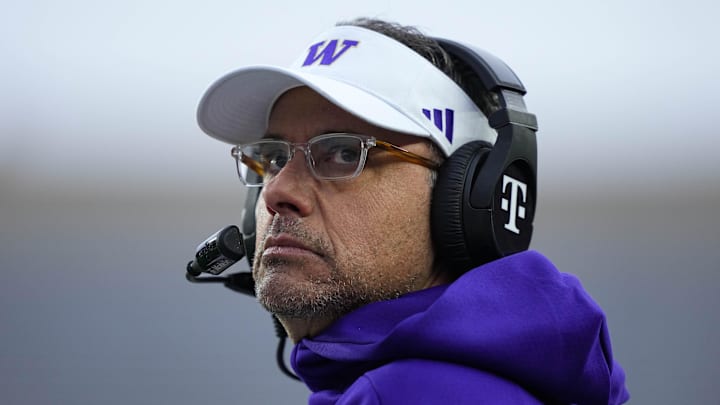 Nov 8, 2025; Madison, Wisconsin, USA; Washington Huskies head coach Jedd Fisch looks on during the first quarter against the Wisconsin Badgers at Camp Randall Stadium. Mandatory Credit: Jeff Hanisch-Imagn Images Nov 8, 2025; Madison, Wisconsin, USA; Washington Huskies head coach Jedd Fisch looks on during the first quarter against the Wisconsin Badgers at Camp Randall Stadium. Mandatory Credit: Jeff Hanisch-Imagn Images