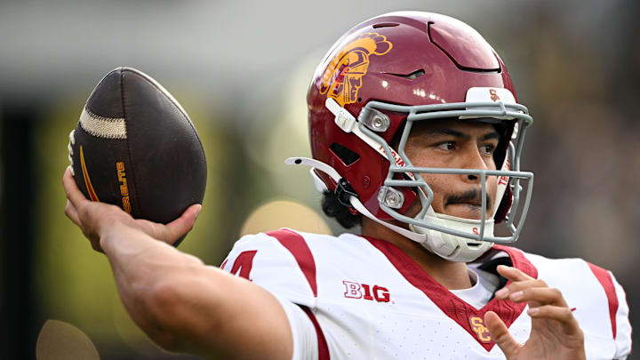 Sep 13, 2025; West Lafayette, Indiana, USA; Southern California Trojans quarterback Jayden Maiava (14) warms up on the sidelines during the first quarter against the Purdue Boilermakers at Ross-Ade Stadium. Mandatory Credit: Marc Lebryk-Imagn Images