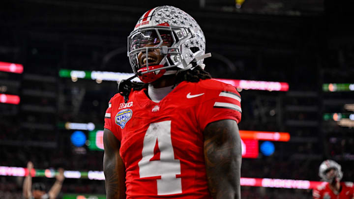 Ohio State Buckeyes wide receiver Jeremiah Smith (4) celebrates after he runs for a touchdown during the 2025 Cotton Bowl