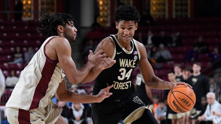 Jan 14, 2023; Chestnut Hill, Massachusetts, USA; Wake Forest Demon Deacons forward Bobi Klintman (34) drives the ball  during the first half against the Boston College Eagles at Conte Forum. Mandatory Credit: Eric Canha-USA TODAY Sports