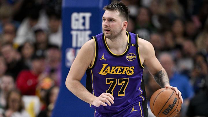 Apr 9, 2025; Dallas, Texas, USA; Los Angeles Lakers guard Luka Doncic (77) brings the ball up court against the Dallas Mavericks during the third quarter at the American Airlines Center. Mandatory Credit: Jerome Miron-Imagn Images
