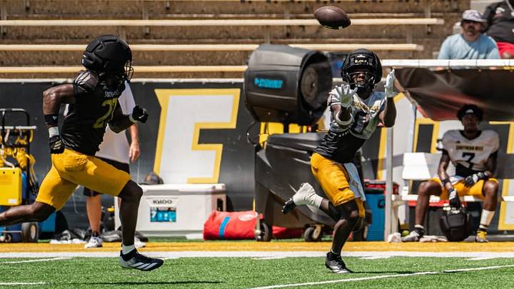 Southern Miss wide receiver Eelijah Singleton breaks loose for a big catch during Saturday's fall camp scrimmage. Southern Miss wide receiver Eelijah Singleton breaks loose for a big catch during Saturday's fall camp scrimmage.