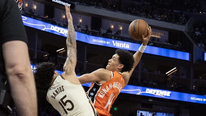 Mar 2, 2026; San Francisco, California, USA; Los Angeles Clippers center Yanic Konan Niederhauser (14) dunks over Golden State Warriors forward Gui Santos (15) during the third quarter at Chase Center. Mar 2, 2026; San Francisco, California, USA; Los Angeles Clippers center Yanic Konan Niederhauser (14) dunks over Golden State Warriors forward Gui Santos (15) during the third quarter at Chase Center.