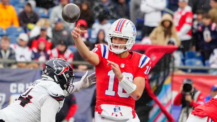 Oct 13, 2024; Foxborough, Massachusetts, USA; New England Patriots quarterback Drake Maye (10) throws the ball against the Houston Texans during the second half at Gillette Stadium. Mandatory Credit: Gregory Fisher-Imagn Images