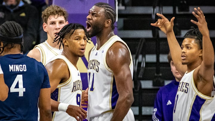 Huskies, from left, Hannes Steinbach, Wesley Yates III, Franck Kepnang and Quimari Peterson look perplexed.