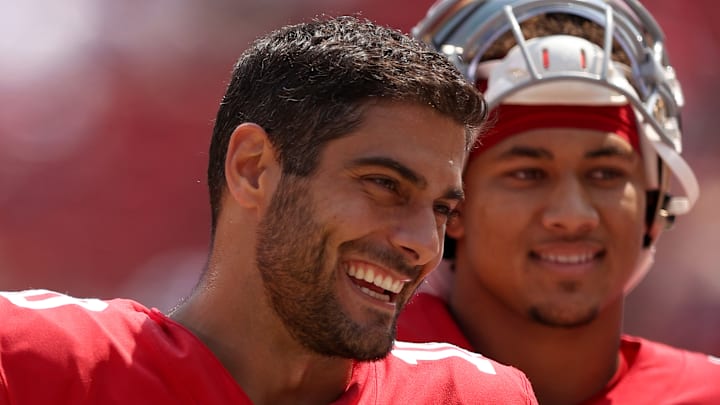 San Francisco 49ers quarterbacks Jimmy Garoppolo (L) and Trey Lance (R)