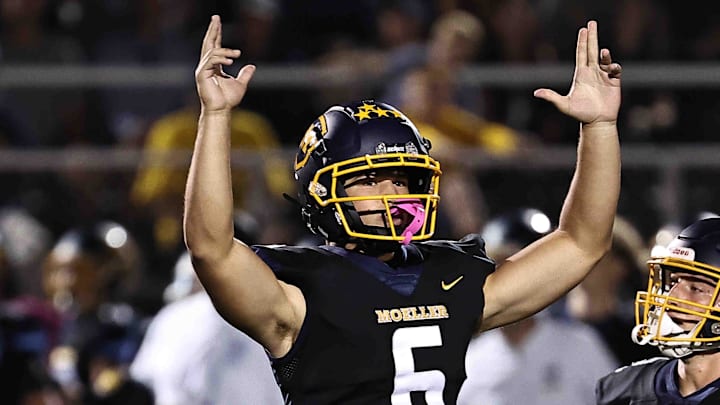 Moeller kicker Jack Mallabar reacts after making a 47-yard field goal during their football game against St. Xavier Friday, Sept. 19, 2025.