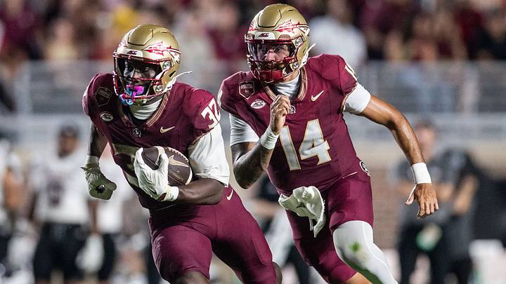 Florida State Seminoles running back Ousmane Kromah (32) sprints towards the end zone. Florida State Seminoles running back Ousmane Kromah (32) sprints towards the end zone.