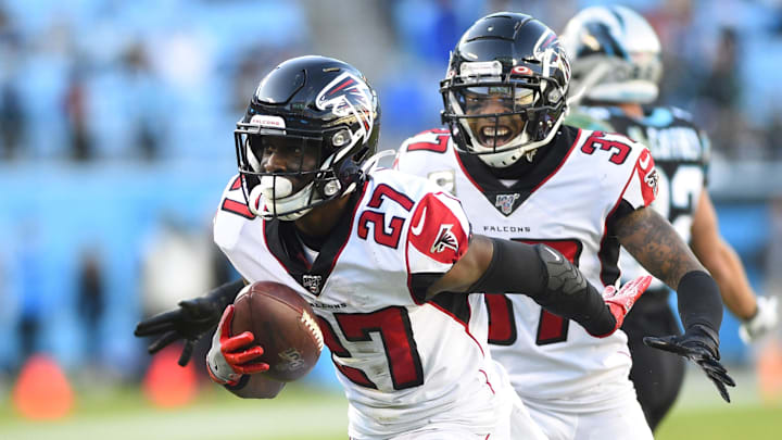 Nov 17, 2019; Charlotte, NC, USA; Atlanta Falcons strong safety Damontae Kazee (27) reacts after an interception as free safety Ricardo Allen (37) is in the background in the fourth quarter at Bank of America Stadium.